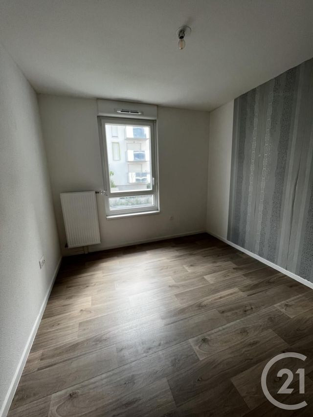 Appartement F4 à louer - 4 pièces - 78.93 m2 - LINGOLSHEIM - 67 - ALSACE - Century 21 Les Victoires