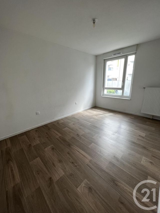 Appartement F4 à louer - 4 pièces - 78.93 m2 - LINGOLSHEIM - 67 - ALSACE - Century 21 Les Victoires