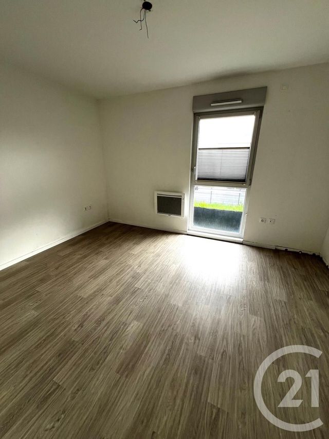 Appartement Duplex à louer - 3 pièces - 61.23 m2 - LINGOLSHEIM - 67 - ALSACE - Century 21 Les Victoires
