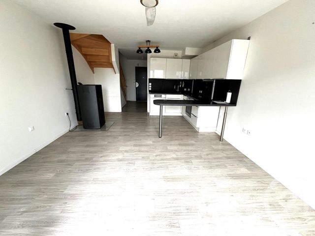 Appartement Duplex à louer - 3 pièces - 61.23 m2 - LINGOLSHEIM - 67 - ALSACE - Century 21 Les Victoires