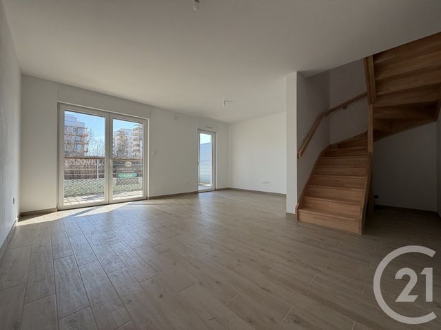 Appartement Duplex à louer - 4 pièces - 80.01 m2 - OSTWALD - 67 - ALSACE - Century 21 Les Victoires