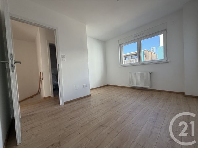Appartement Duplex à louer - 4 pièces - 80.01 m2 - OSTWALD - 67 - ALSACE - Century 21 Les Victoires