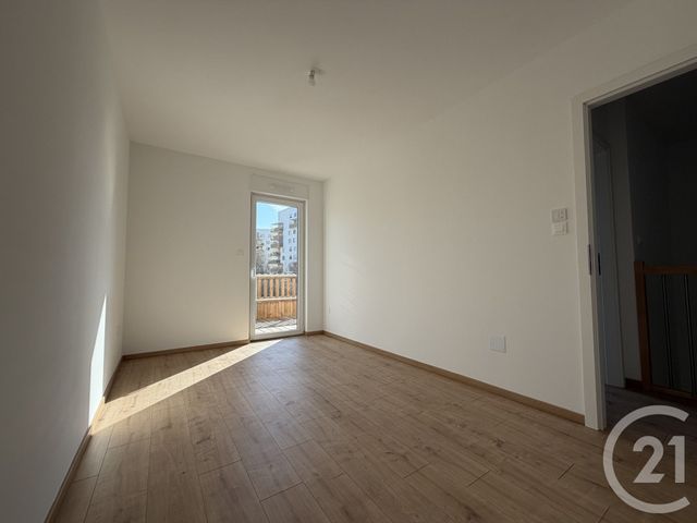 Appartement Duplex à louer - 4 pièces - 80.01 m2 - OSTWALD - 67 - ALSACE - Century 21 Les Victoires