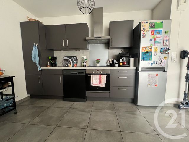 Appartement F3 à louer - 3 pièces - 65.09 m2 - LINGOLSHEIM - 67 - ALSACE - Century 21 Les Victoires
